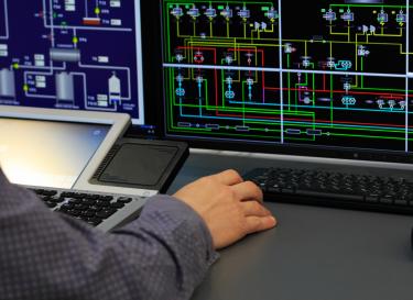a person controlling power systems monitoring equipment