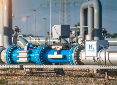 pipes in a hydrogen gas power plant with blue sky